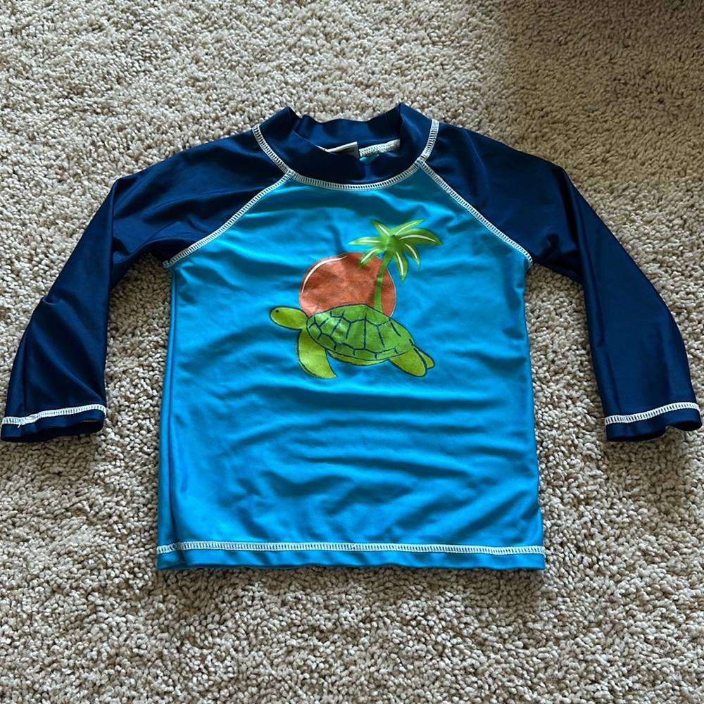 Flap happy 2T swim shirt
